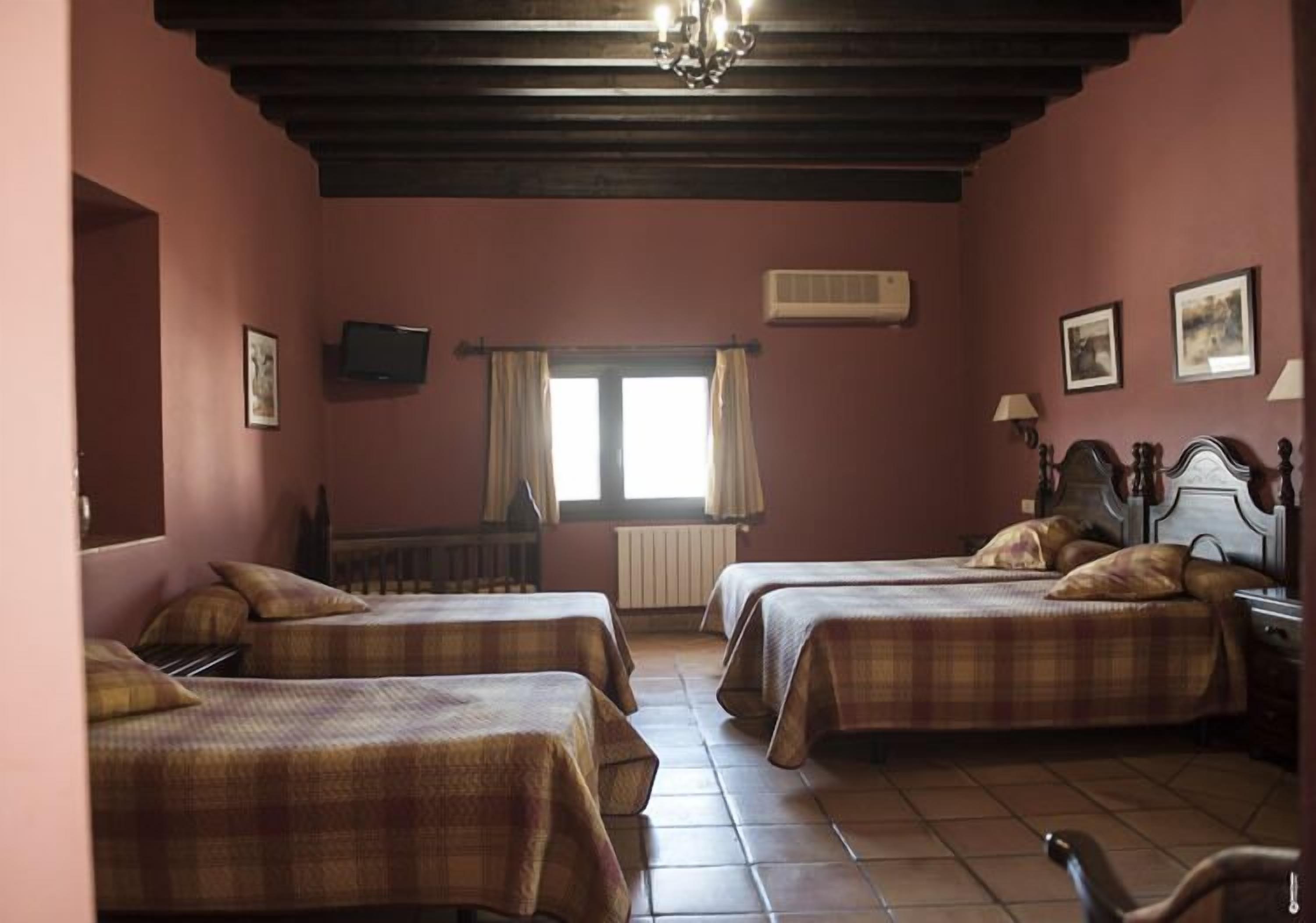 family room | desk, blackout curtains, soundproofing, free cots/infant beds