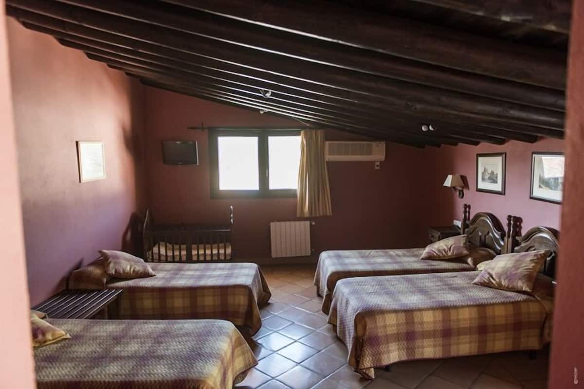 family room | desk, blackout curtains, soundproofing, free cots/infant beds