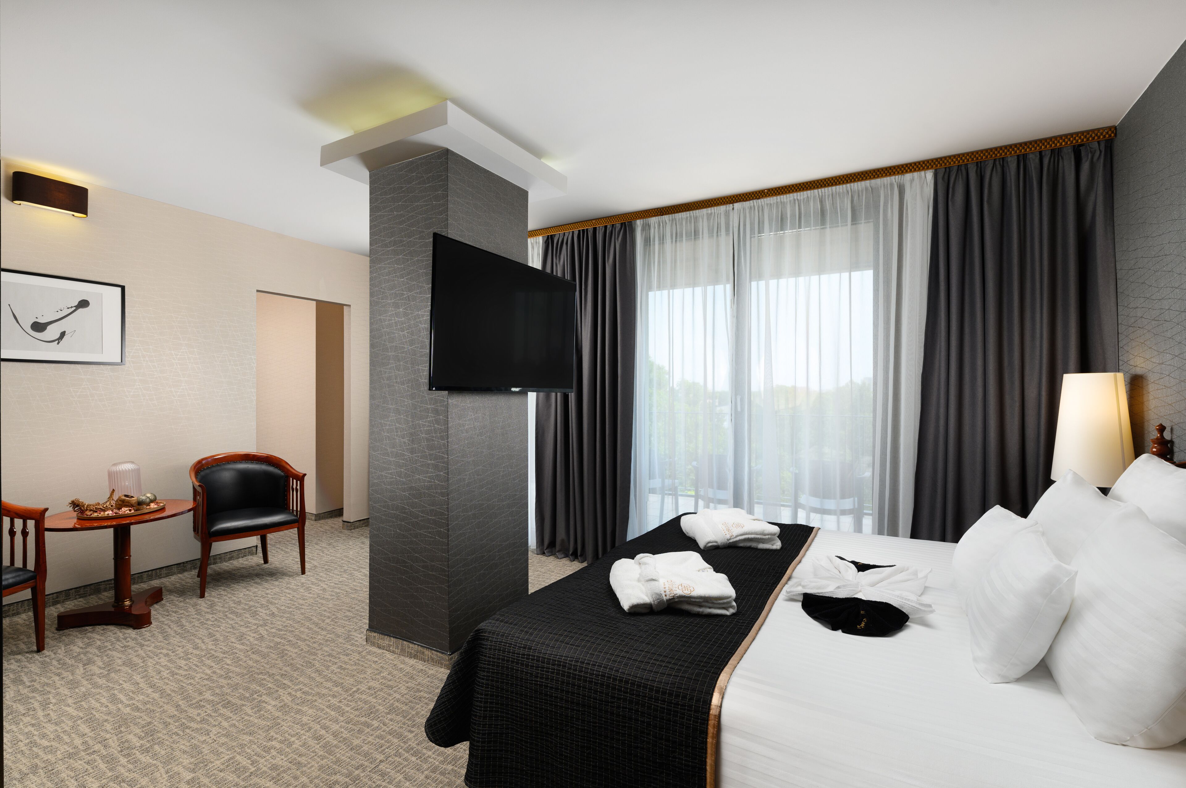 royal suite | in-room safe, desk, laptop workspace, blackout curtains