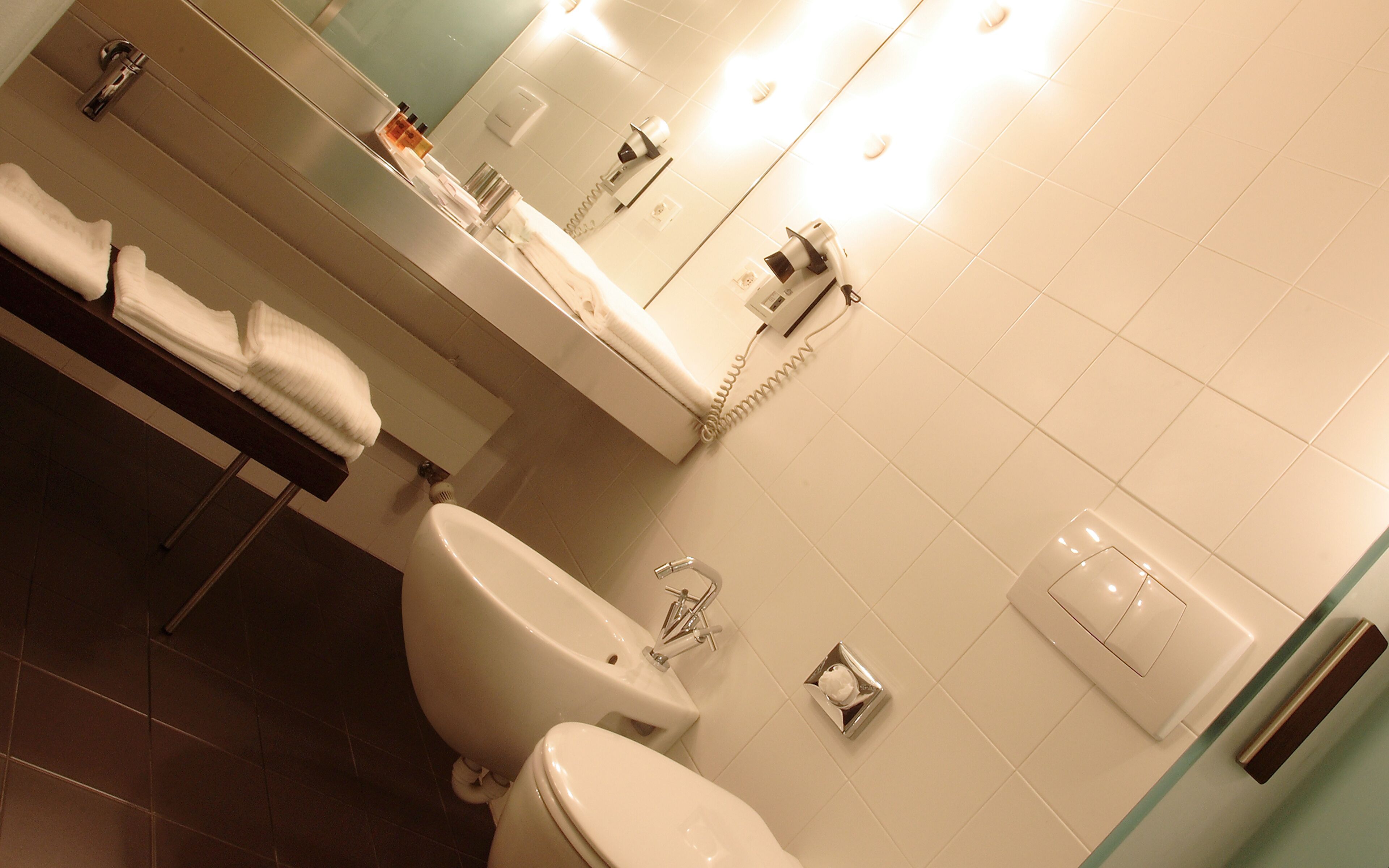 superior quadruple room, annex building | bathroom | designer toiletries, hair dryer, bidet, towels