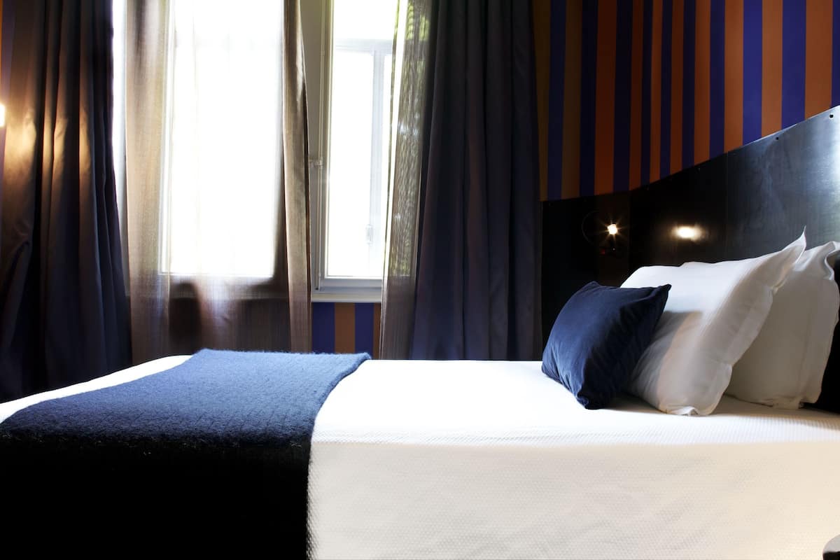 standard double or twin room | premium bedding, down duvets, in-room safe, desk