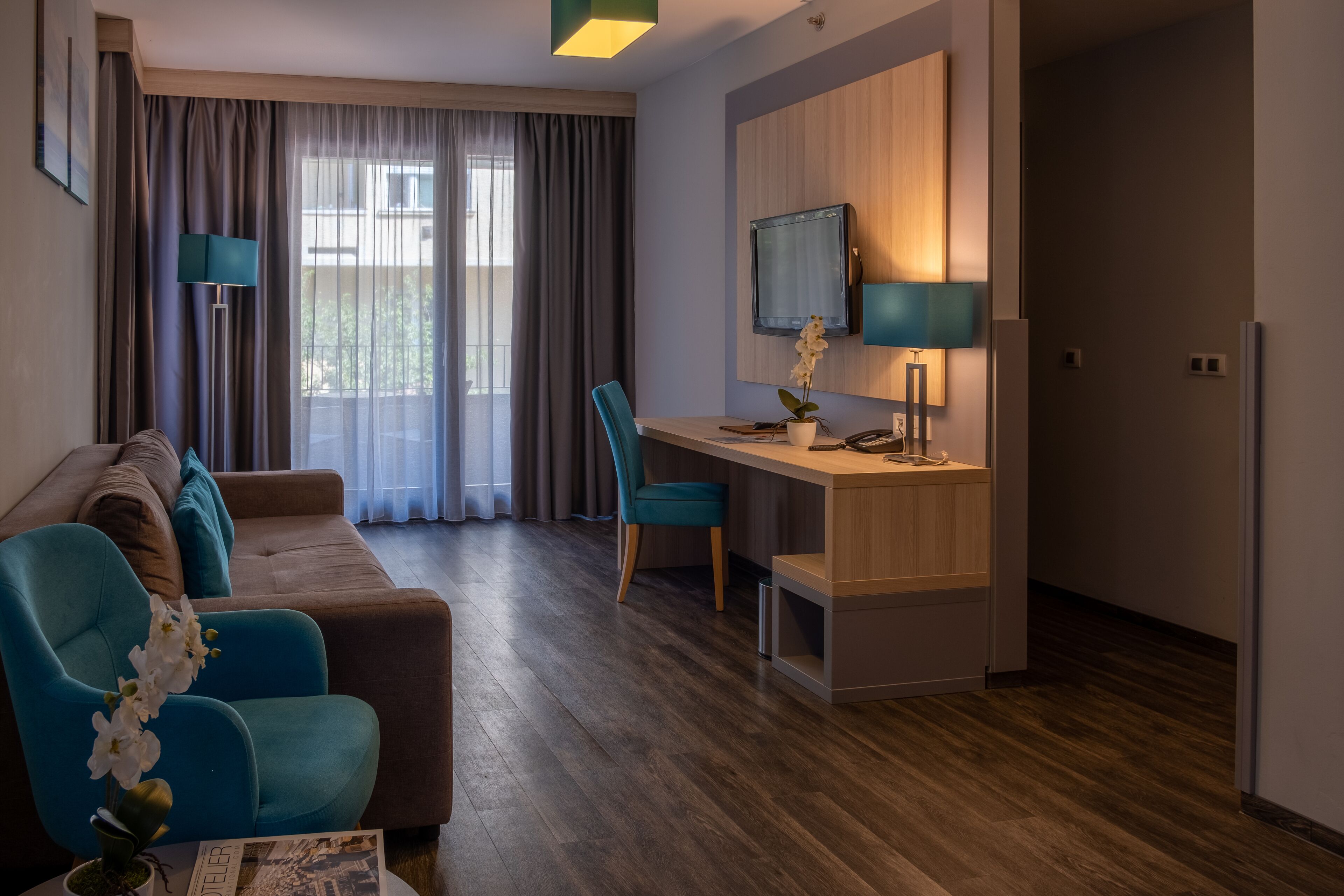 superior studio with balcony | living area | 32-inch lcd tv with satellite channels, tv