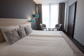 Ropa de cama de alta calidad y minibar