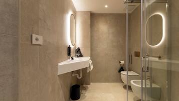 Bathtub, hair dryer, towels, soap