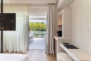 Junior Suite, Hot Tub | Minibar, in-room safe, desk, laptop workspace