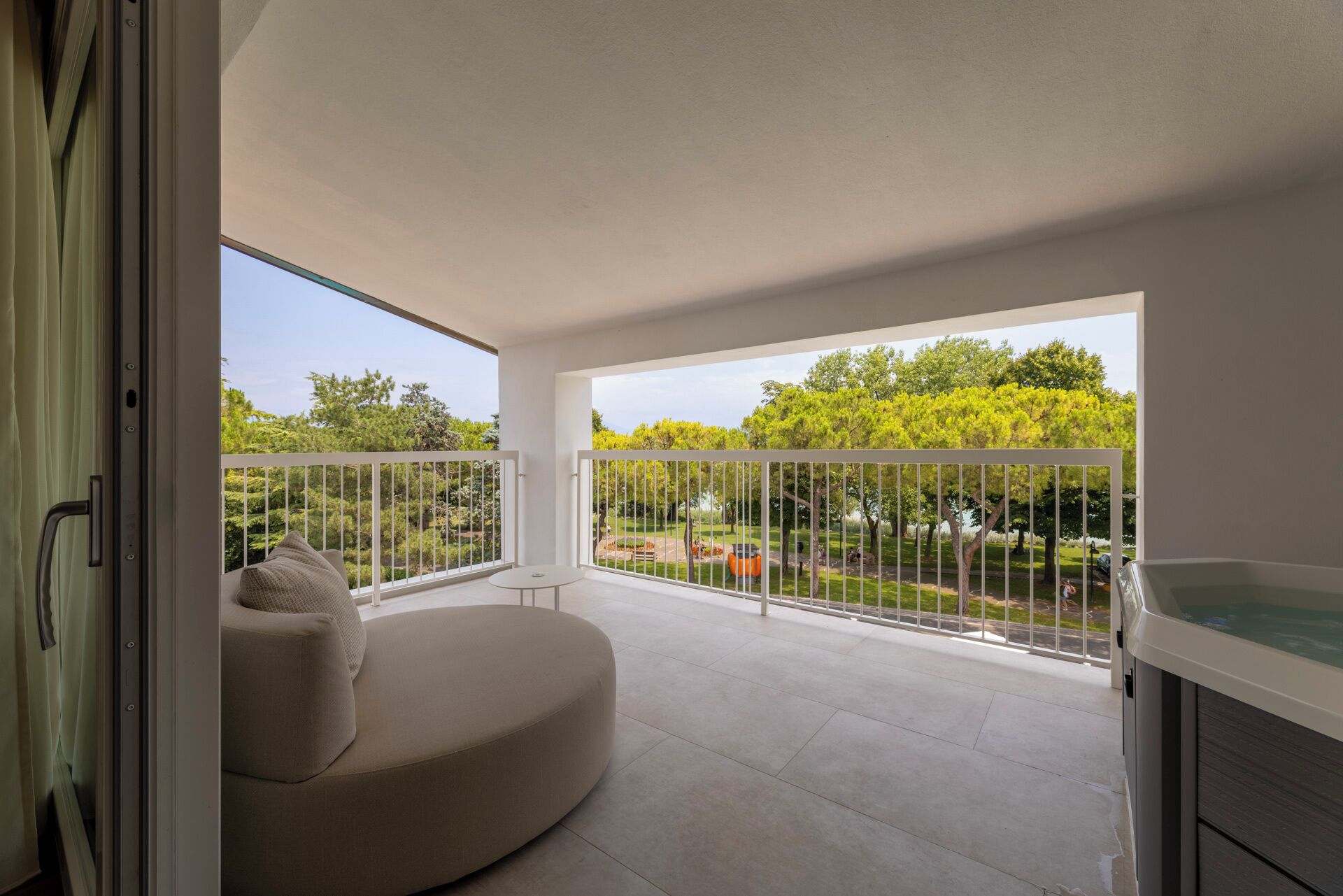 premium suite, hot tub, lake view | minibar, in-room safe, desk, laptop workspace