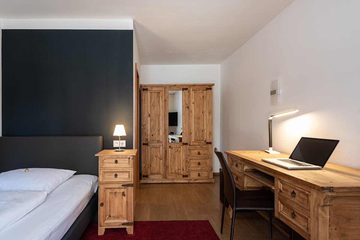 Luxe beddengoed, donzen dekbedden, Select Comfort-bedden, een minibar
