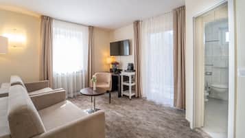 Family Room | Premium bedding, down comforters, Select Comfort beds, minibar