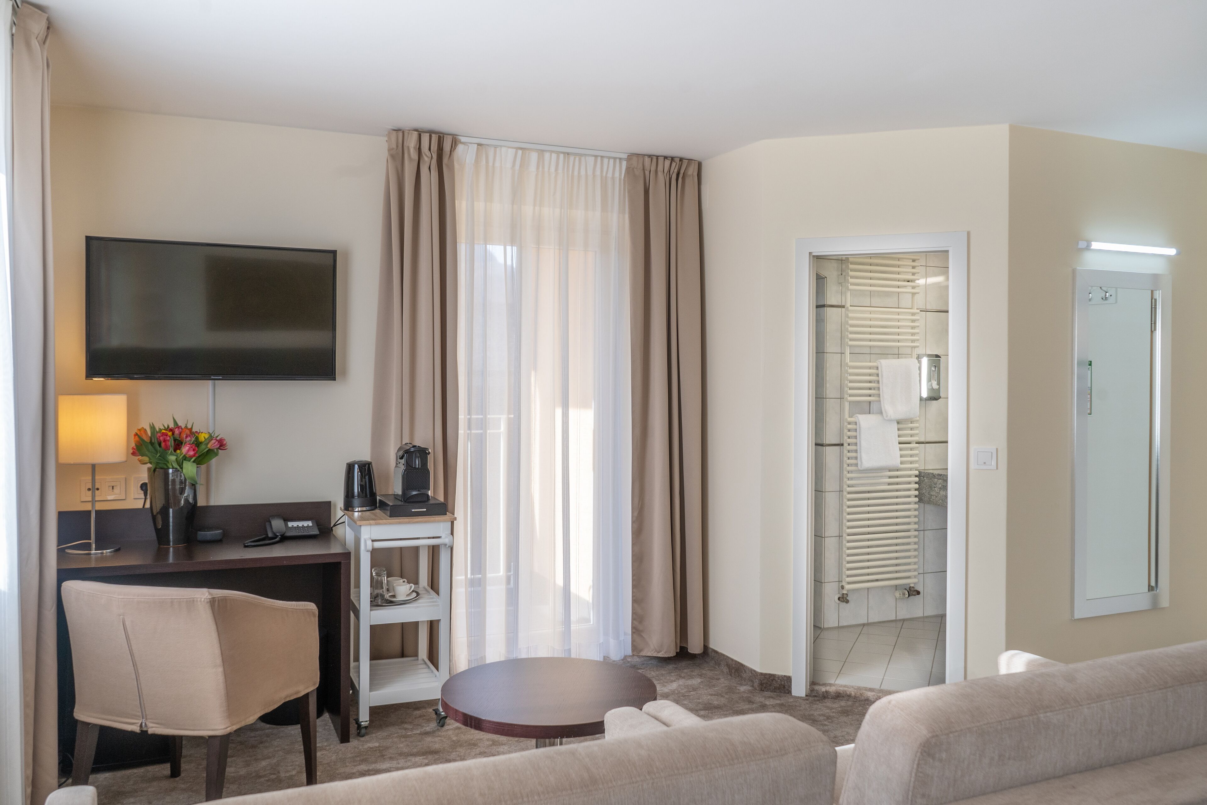 family room | premium bedding, down duvets, select comfort beds, minibar