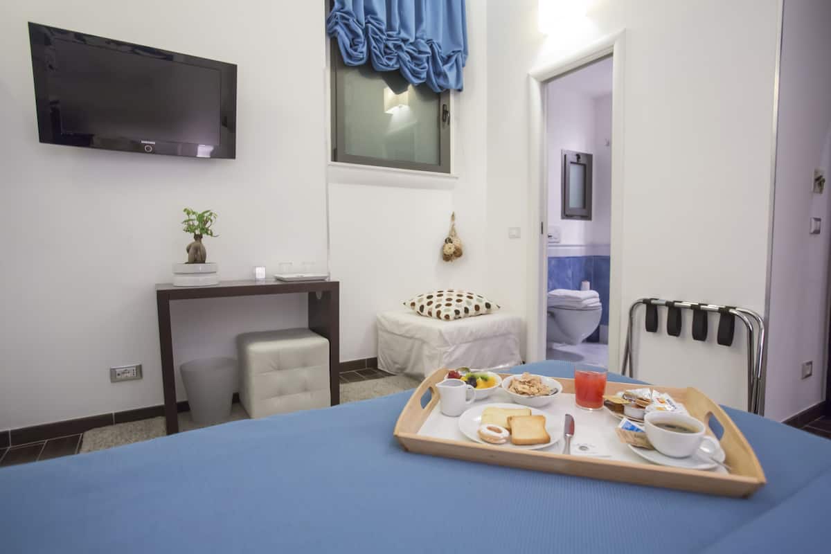 Tweepersoonskamer (with extra bed) | Luxe beddengoed, Select Comfort-bedden, een minibar