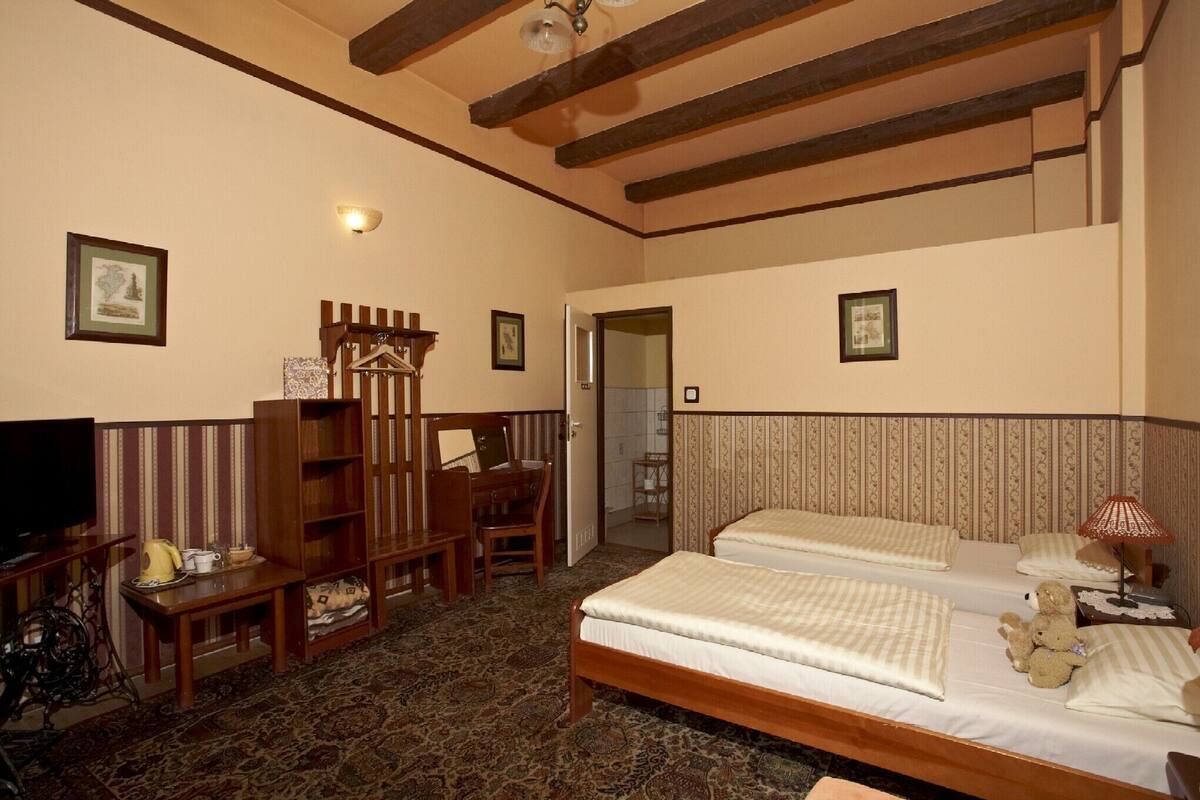Premium bedding, desk, iron/ironing board (on request)