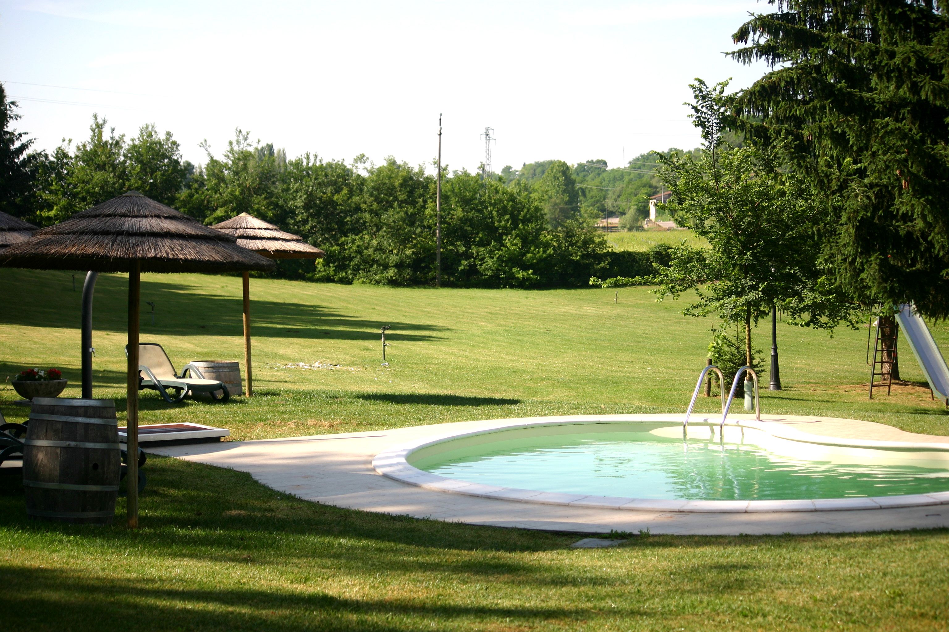 Seasonal outdoor pool, pool umbrellas, sun loungers