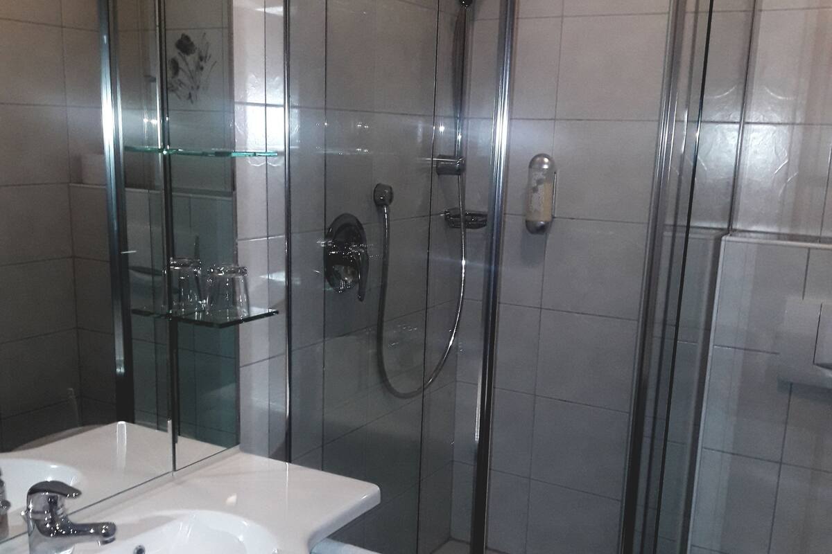 suite for single occupany | bathroom | hair dryer, towels