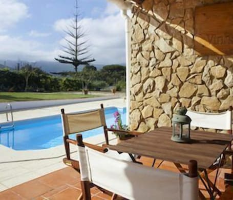 Seasonal outdoor pool, pool umbrellas