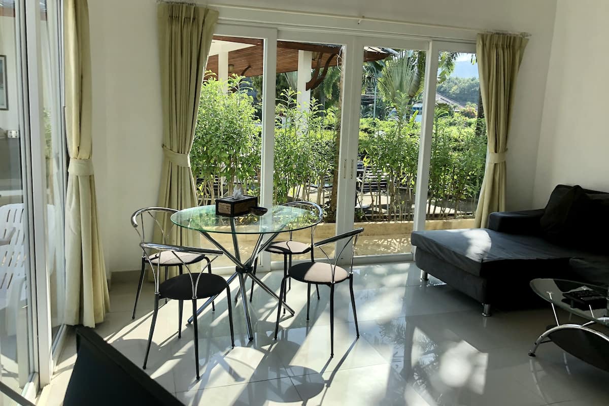 premium apartment, 2 bedrooms, pool view, ground floor | memory-foam beds, in-room safe, blackout curtains, iron/ironing board