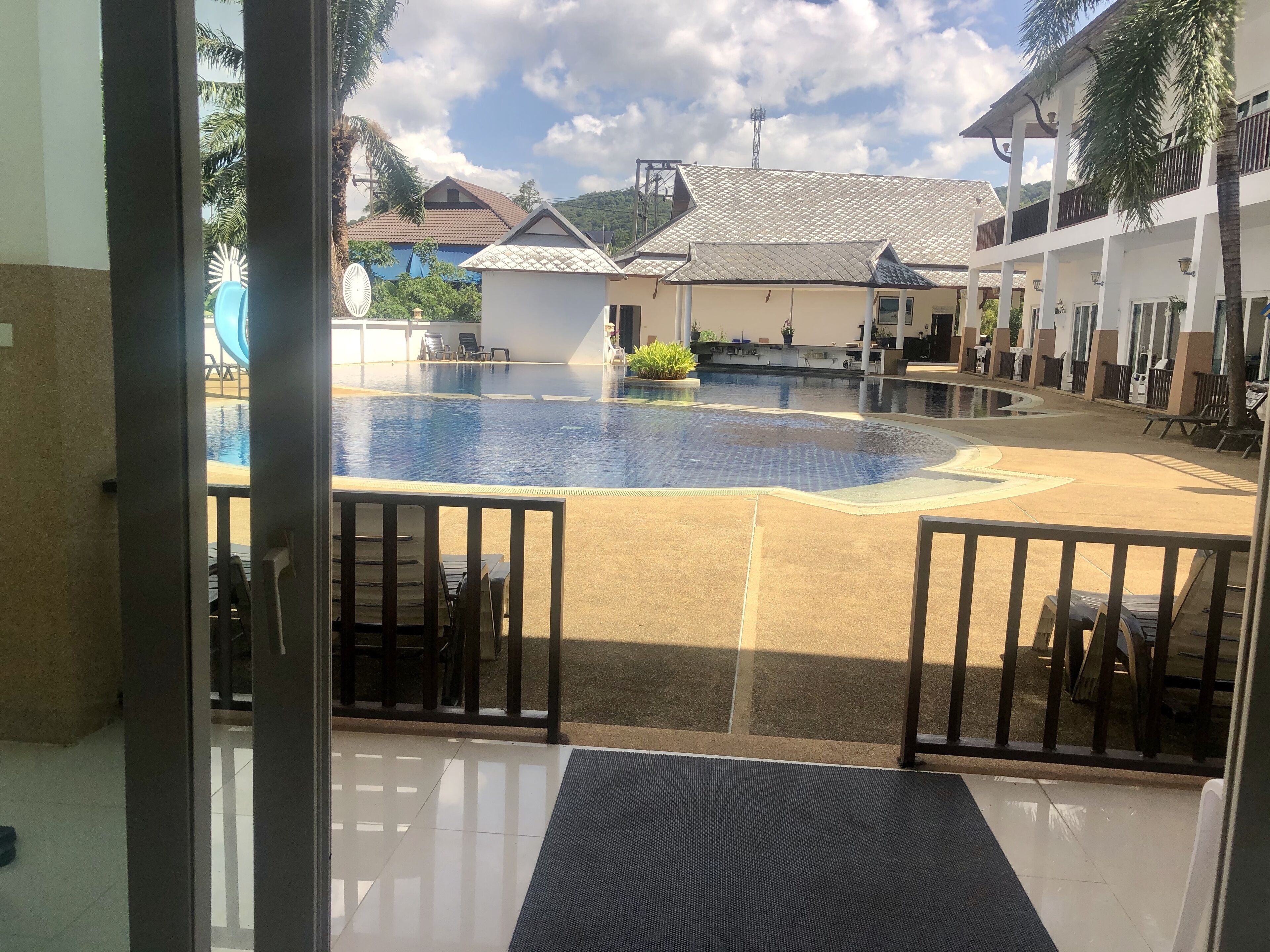 premium apartment, 1 king bed, pool view, poolside | memory-foam beds, in-room safe, blackout curtains, iron/ironing board