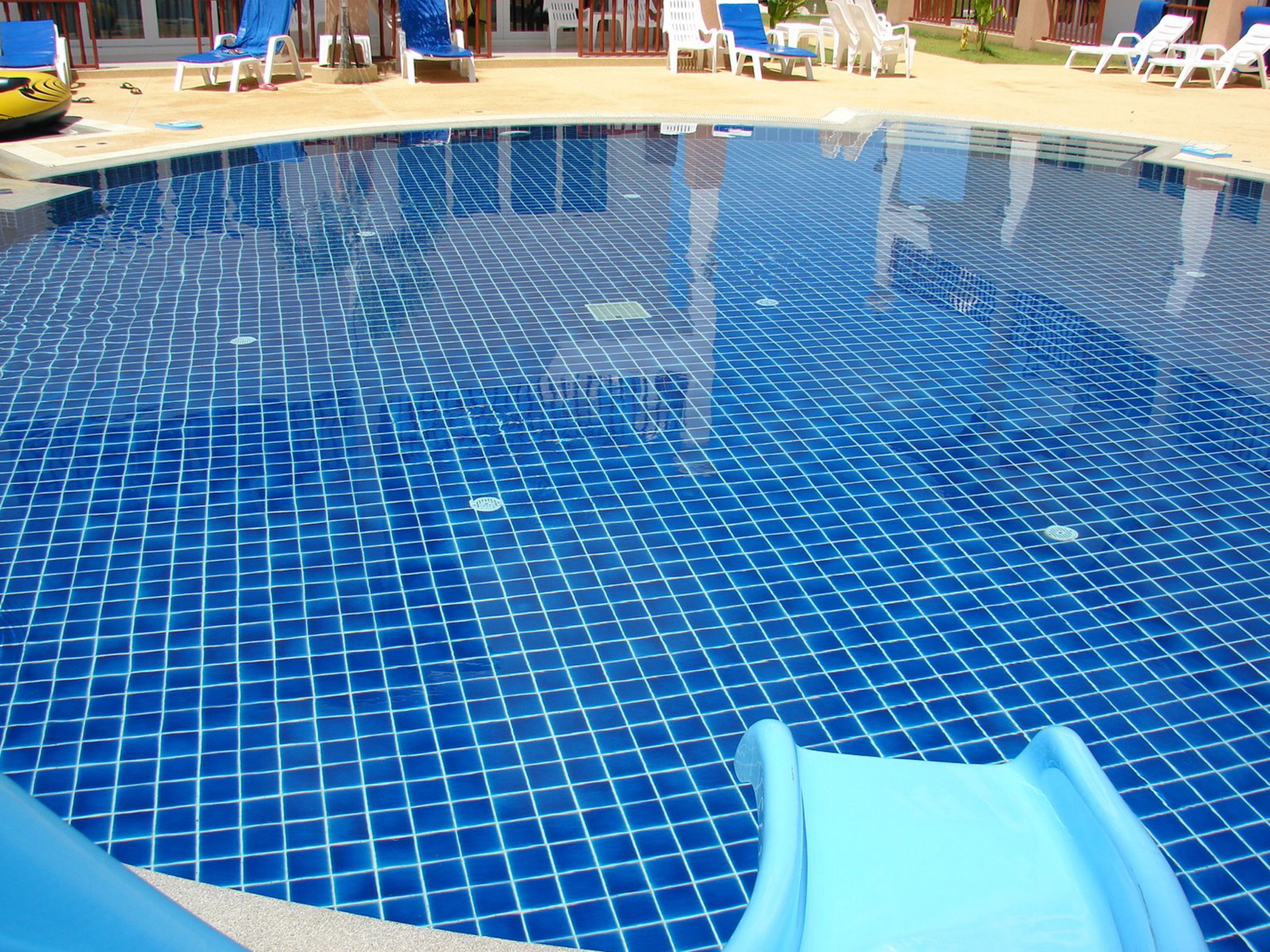 outdoor pool, pool umbrellas, pool loungers