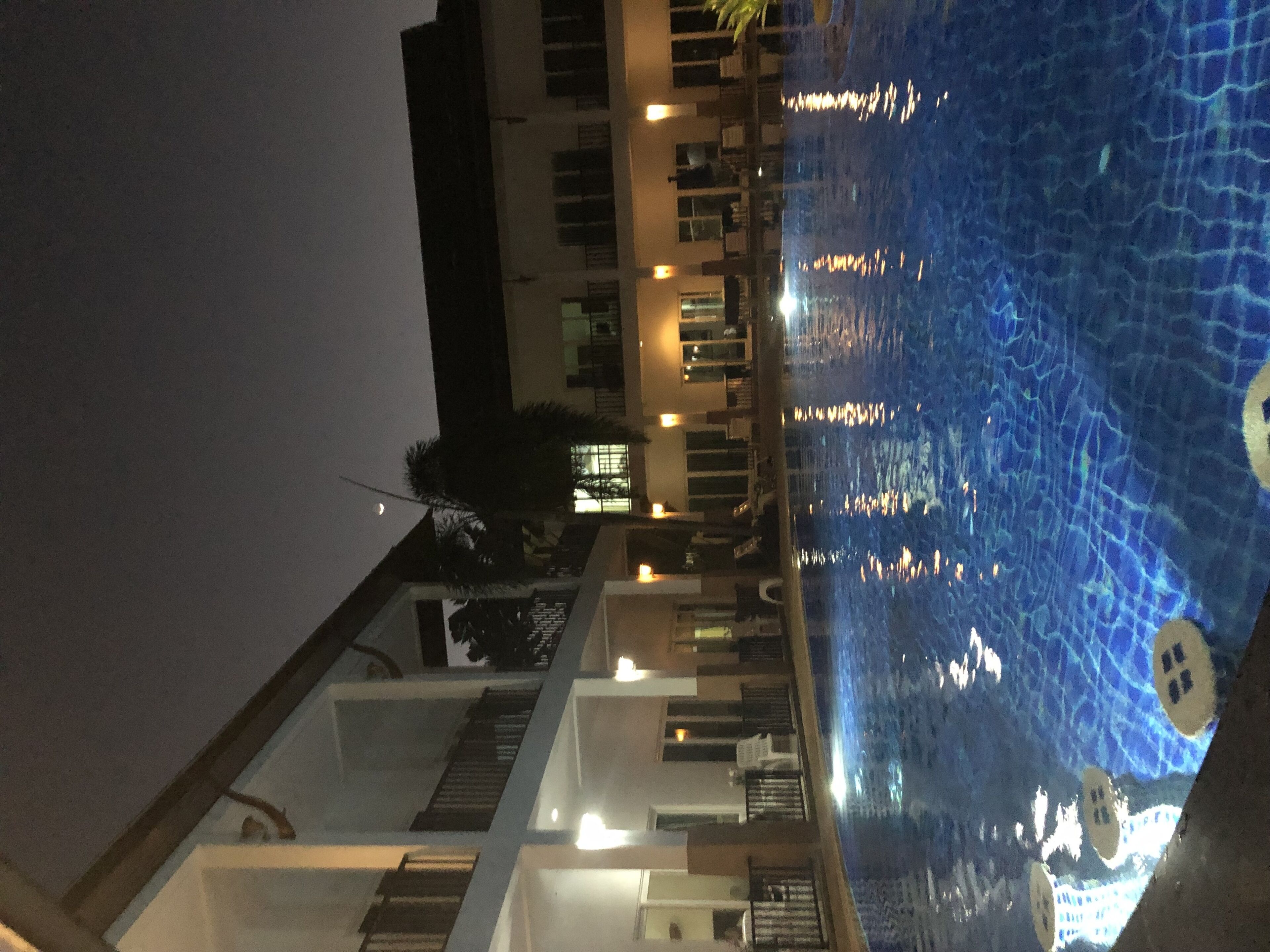 outdoor pool, pool umbrellas, pool loungers