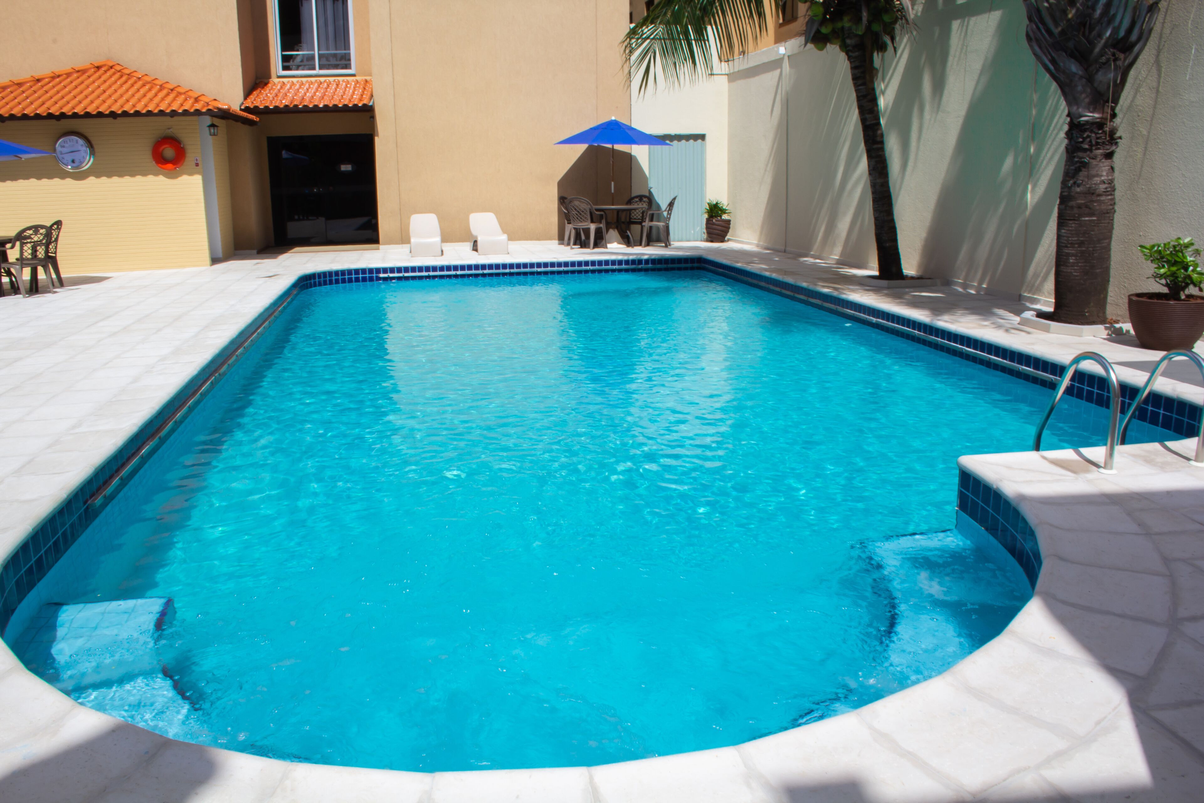 outdoor pool, pool loungers