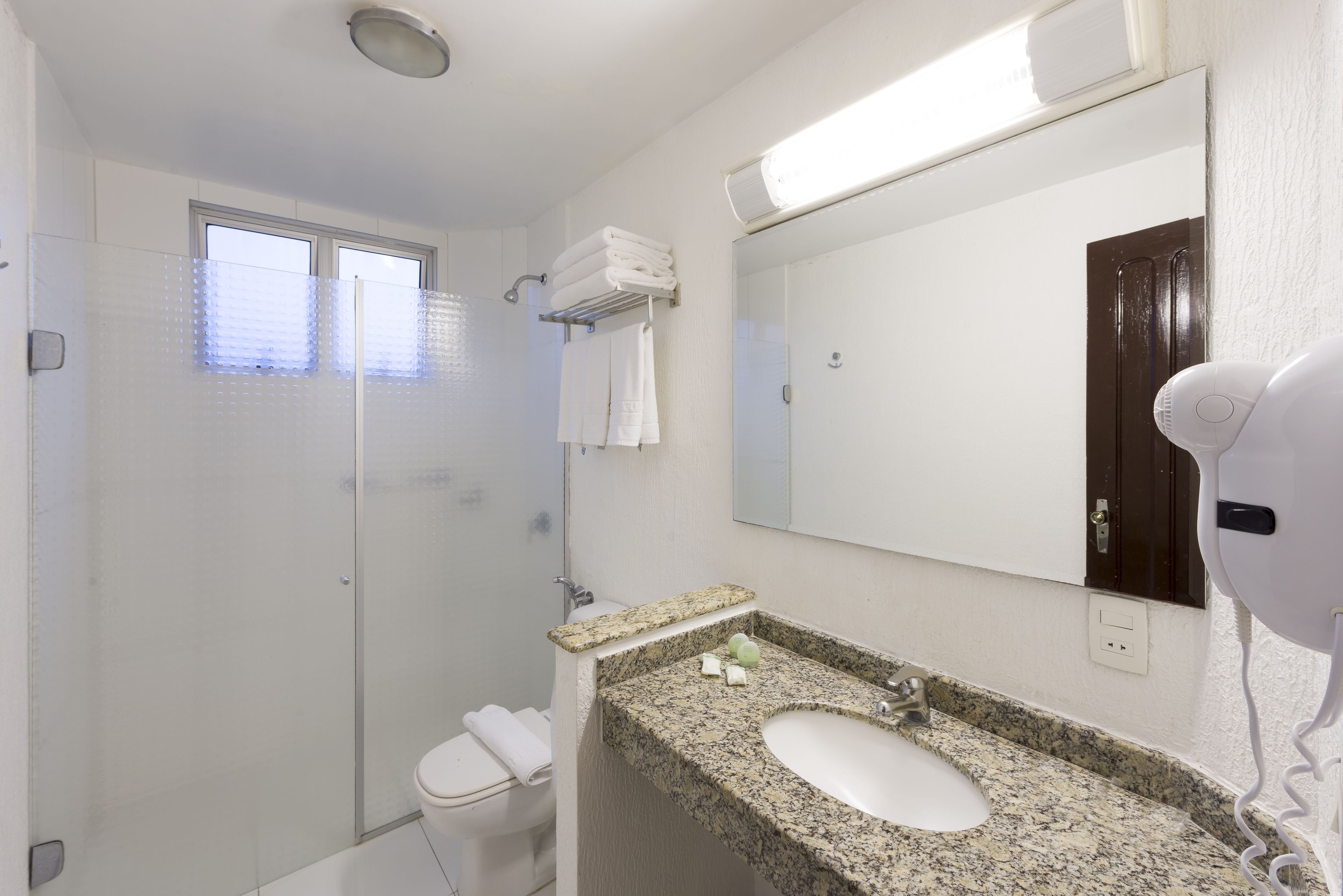 shower, free toiletries, hair dryer, towels