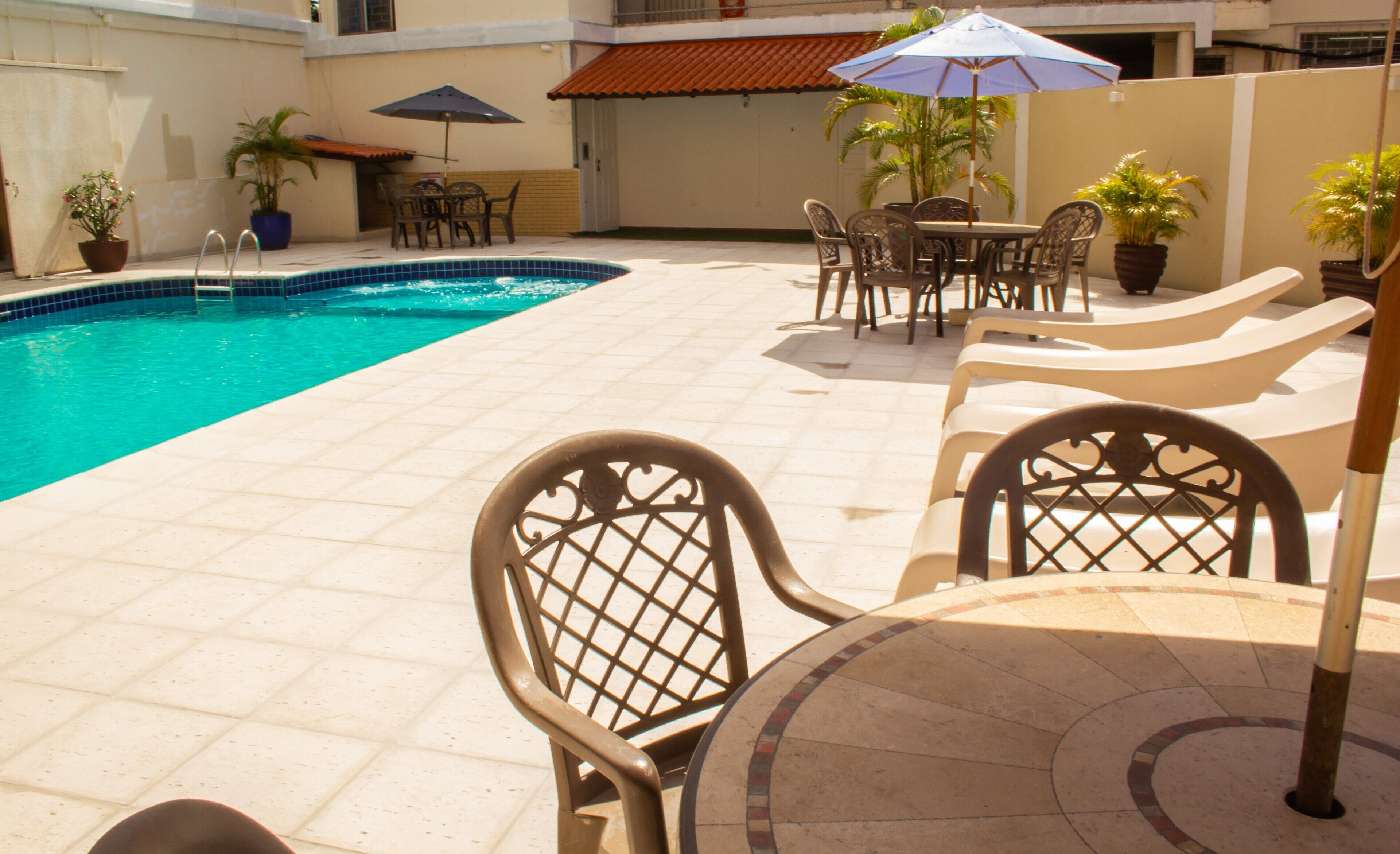 outdoor pool, pool loungers