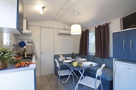 In-room dining. Villaggio Camping Bosco Selva