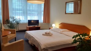 Double Room | Desk, blackout drapes, iron/ironing board, cribs/infant beds