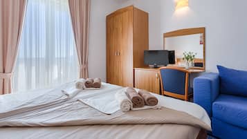 Einzelzimmer | 1 Schlafzimmer, Minibar, Zimmersafe, Schreibtisch