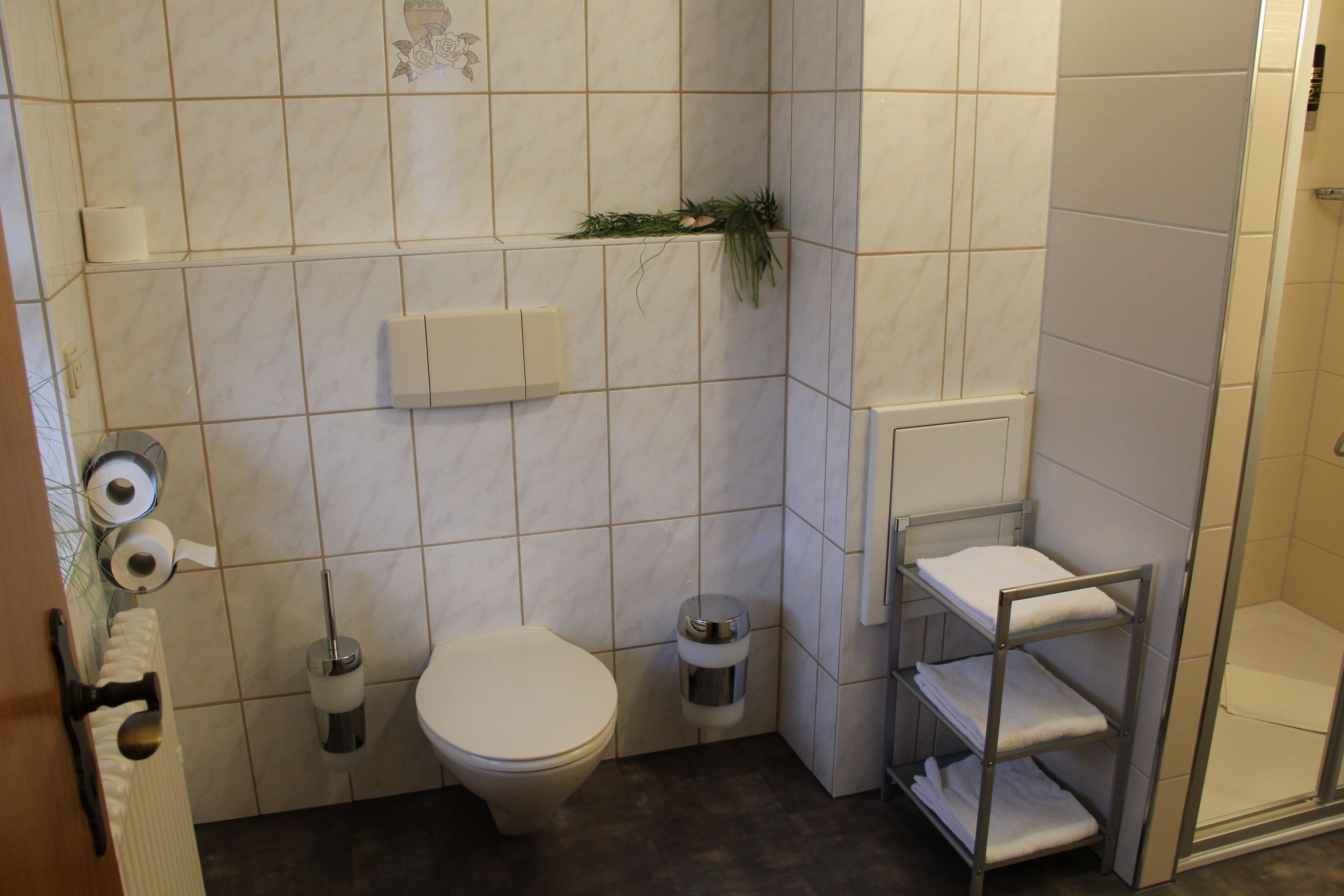 family room | bathroom | shower, hair dryer, towels, soap