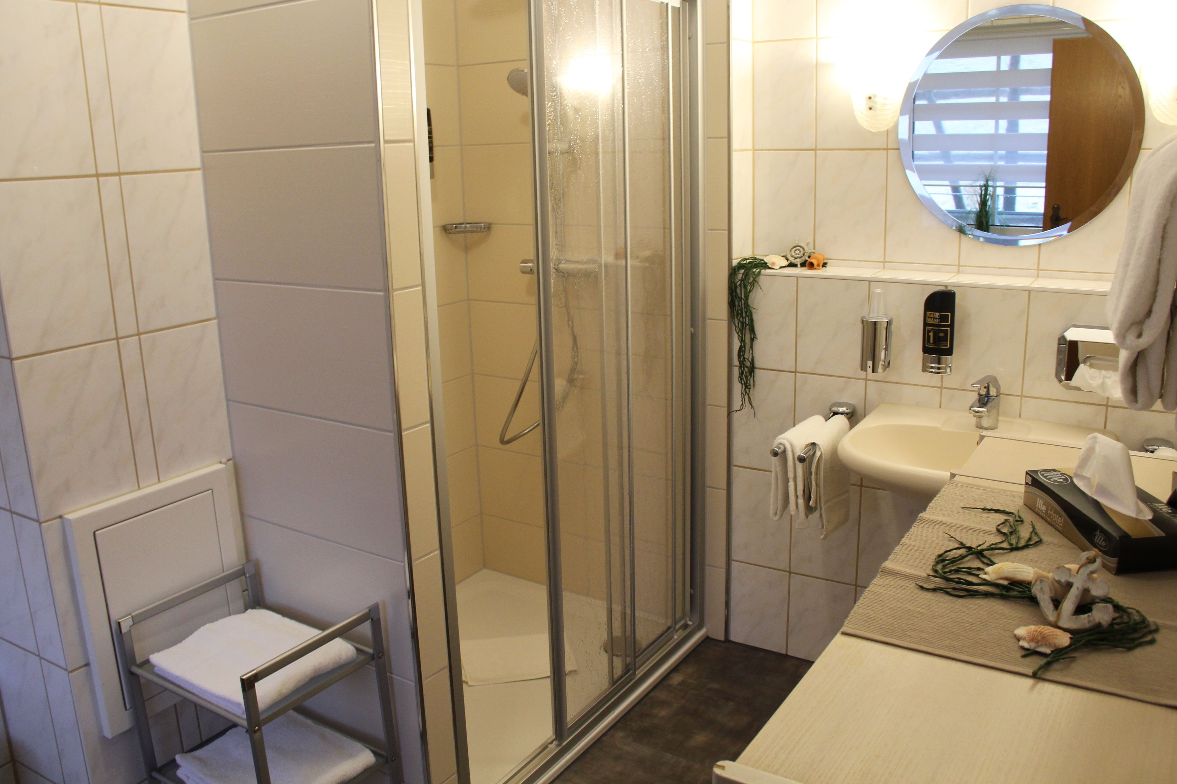 family room | bathroom | shower, hair dryer, towels, soap