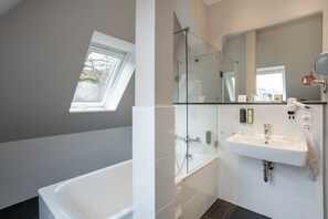 Grand Suite Double | Bathroom | Rainfall showerhead, eco-friendly toiletries, hair dryer, towels