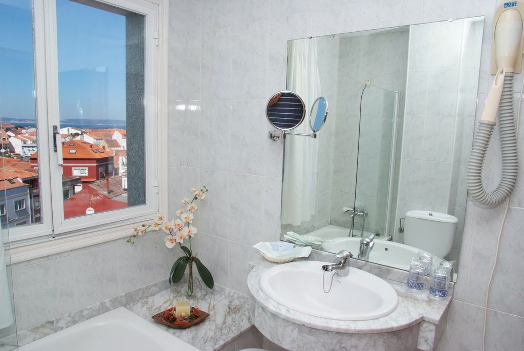 double room | bathroom | shower, hair dryer, bidet, towels