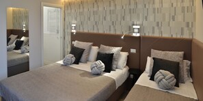 Triple Room | Select Comfort beds, in-room safe, desk, blackout curtains - B&B At Your Place (Rome)