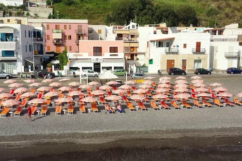 Sulla spiaggia, teli da spiaggia