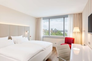 Pillowtop beds, minibar, in-room safe, desk