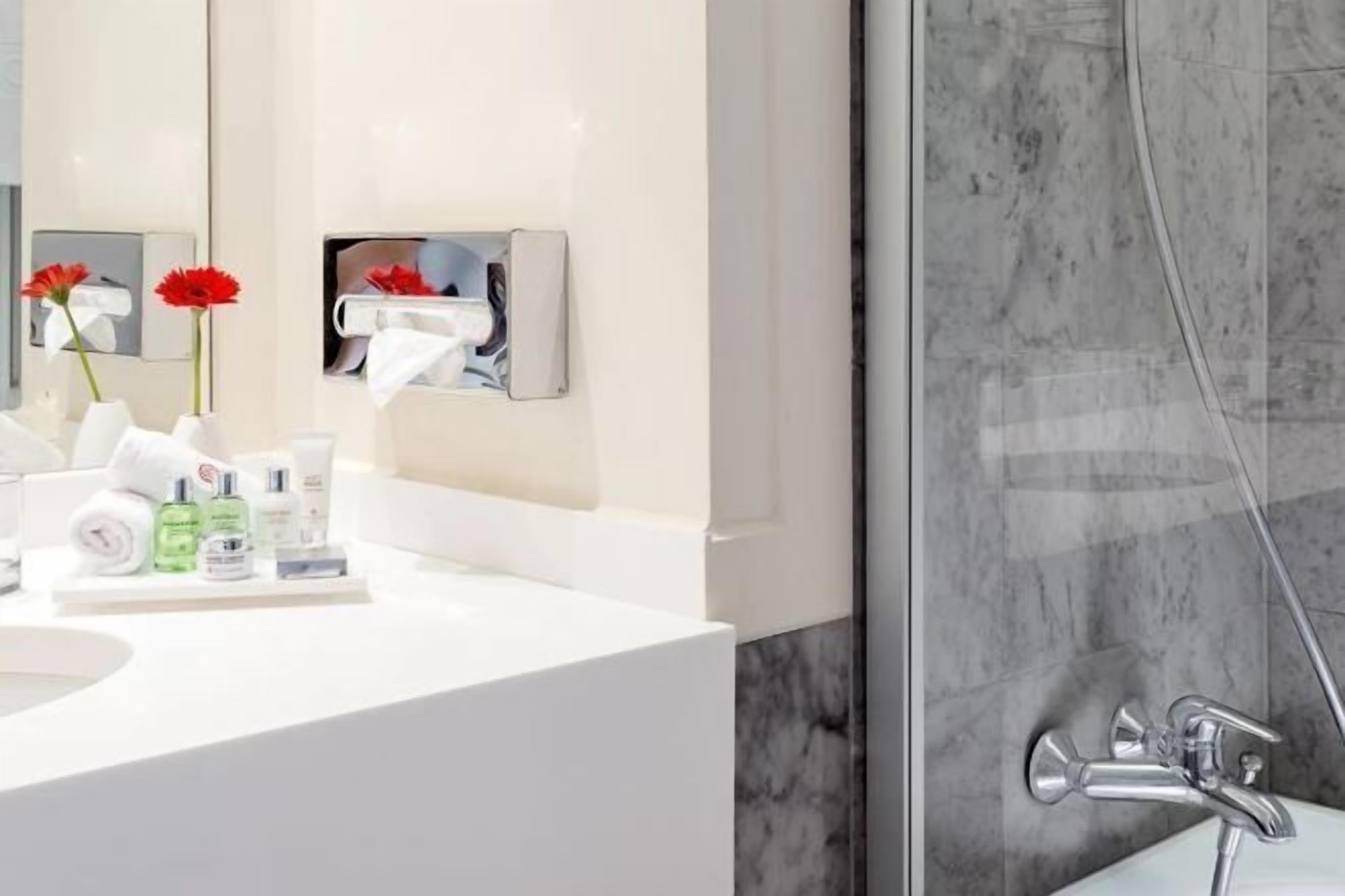 Shower, rainfall showerhead, eco-friendly toiletries, hair dryer