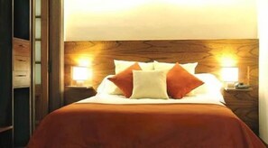 Premium bedding, down comforters, pillowtop beds, in-room safe