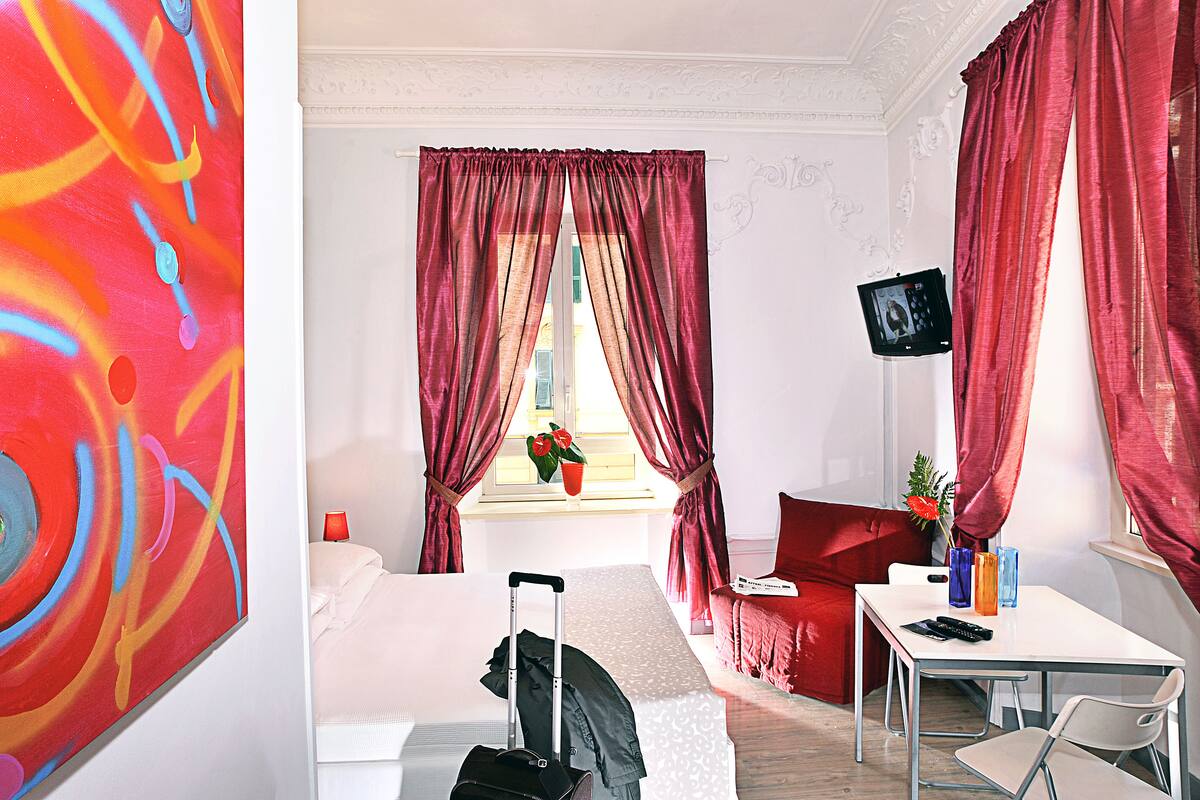 In-room safe, individually decorated, desk, rollaway beds