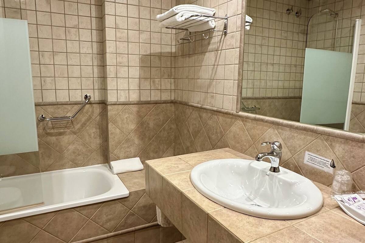 single room | bathroom | hair dryer, bathrobes, bidet, towels