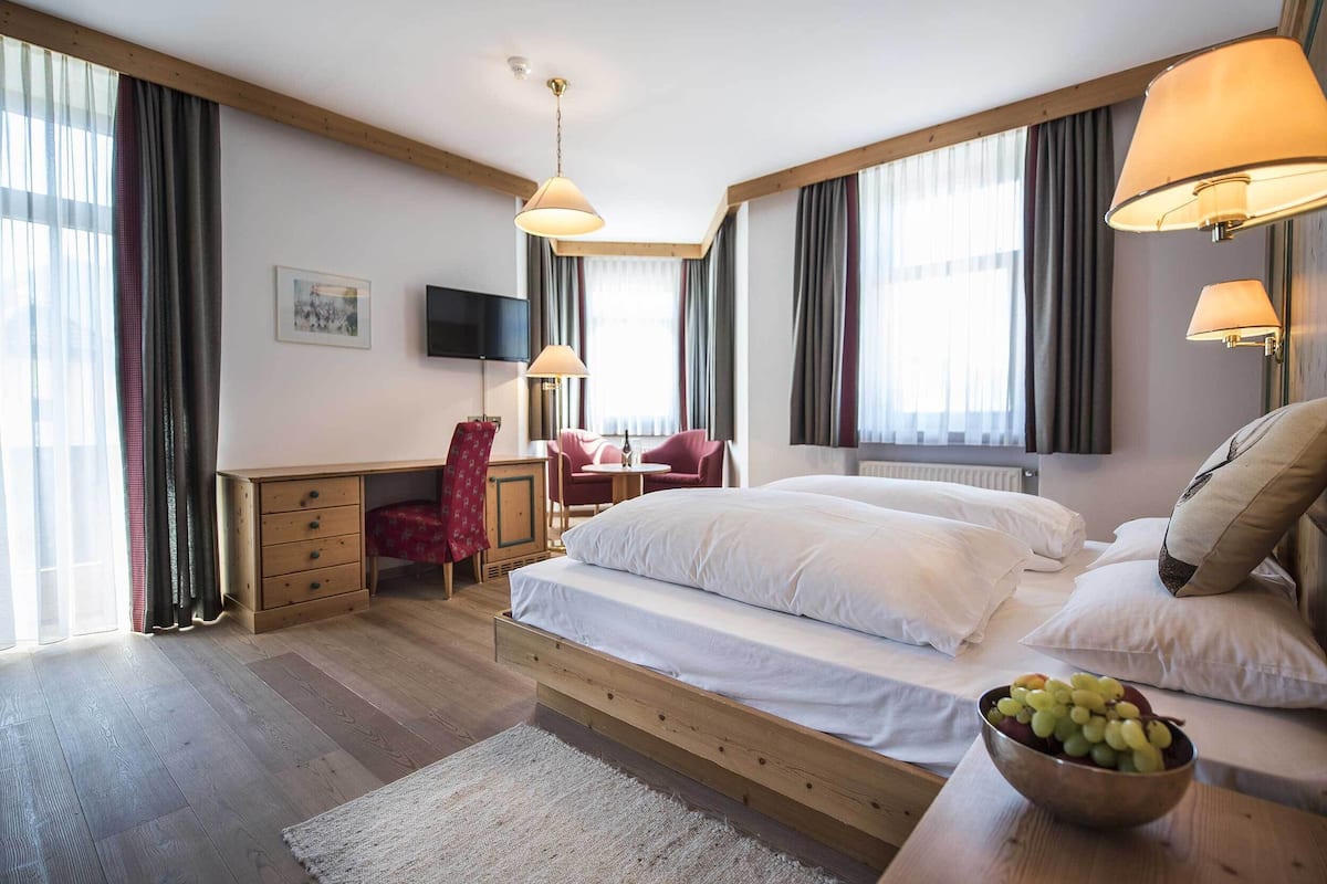 Junior Suite | Down duvets, minibar, in-room safe, individually decorated