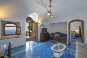 Flat-screen TV, pay movies