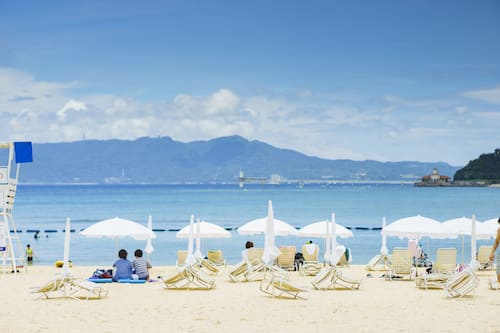 White sand, beach umbrellas