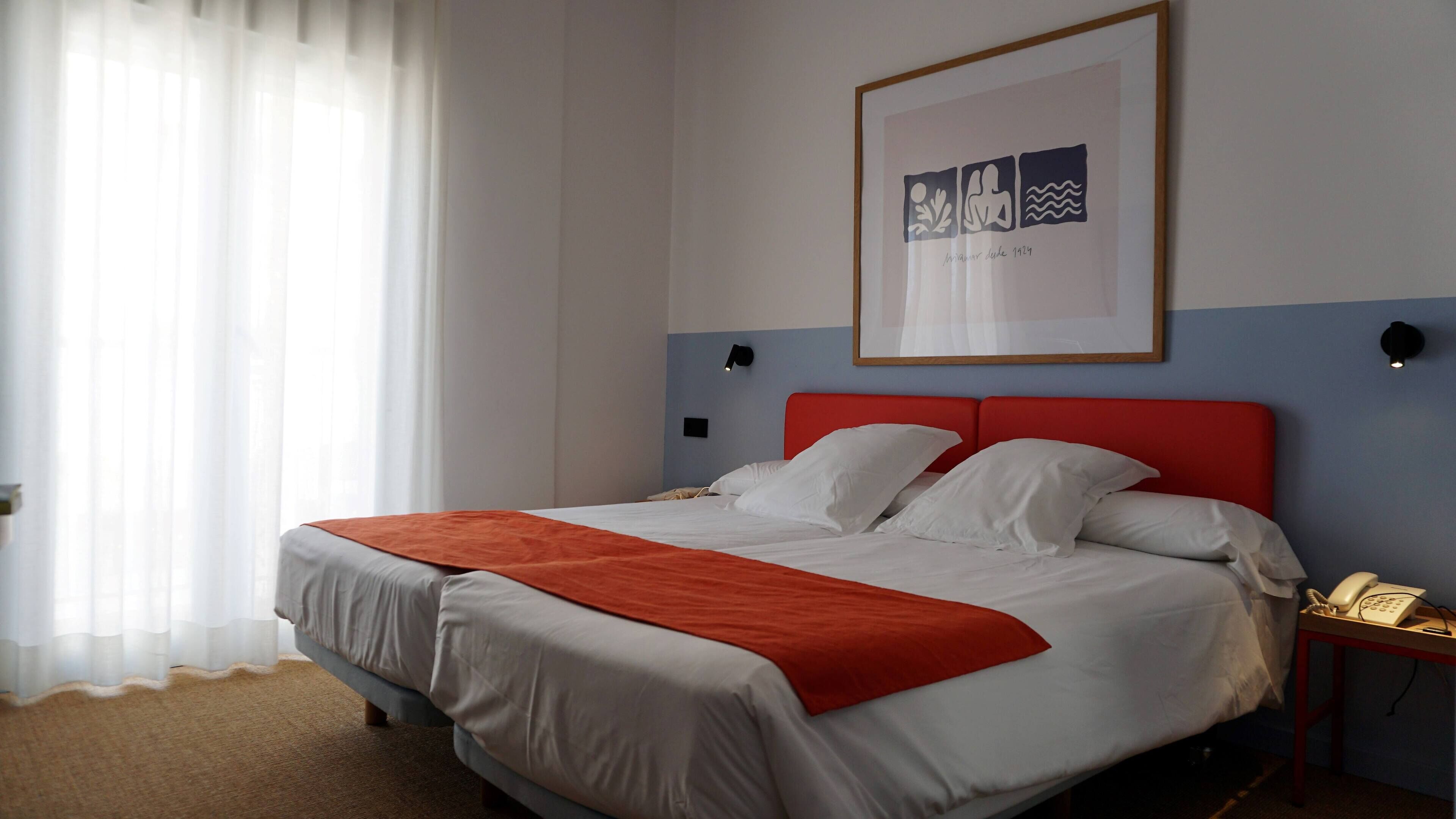 Standard Twin Room | Down duvets, minibar, in-room safe, individually decorated