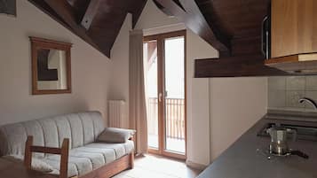 Superior Apartment, 1 Bedroom | Living area | Flat-screen TV