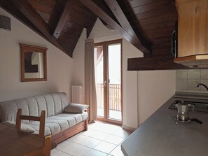 Superior Apartment, 1 Bedroom | Living area | Flat-screen TV