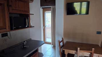 Appartamento Superior, 1 camera da letto | Area soggiorno | TV a schermo piatto