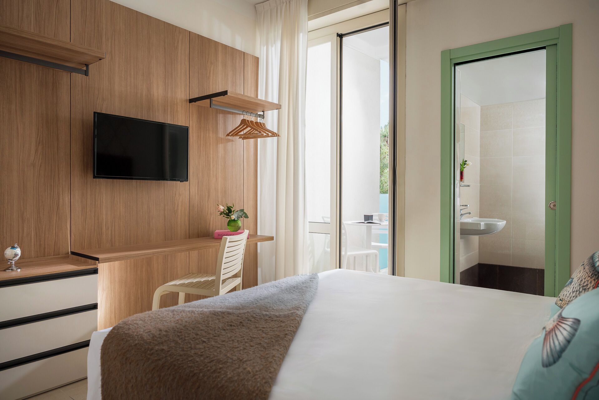 Premium bedding, down duvets, in-room safe, desk