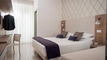 Premium bedding, down comforters, in-room safe, desk