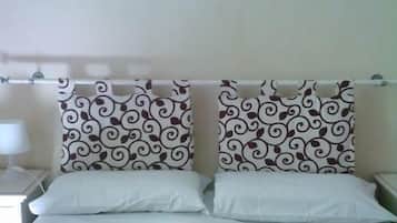 Egyptian cotton sheets, down comforters, memory foam beds, desk