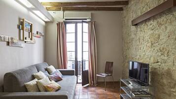 Standard Apartment, 2 Bedrooms, Balcony | Living area | Plasma TV